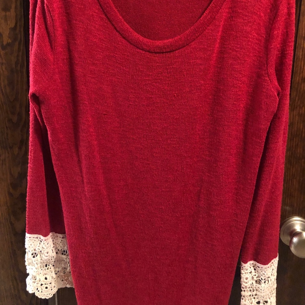 Tunic style lace detailed cuffed sleeves